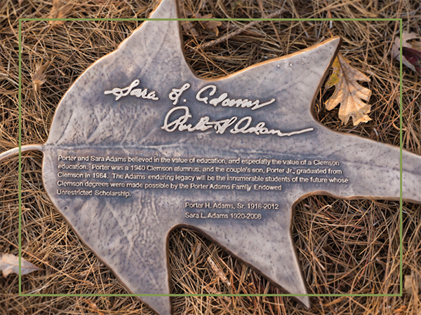 Bronze oak leaf in honor of Porter H. and Sarah L. Adams.