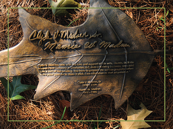 Bronze oak leaf in honor of Clyde V. and Mamie Westendoff Madren Sr.