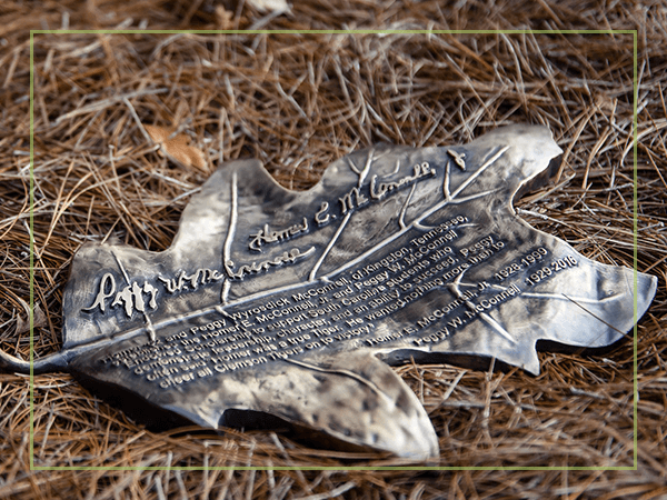 Bronze oak leaf in honor of Homer McConnell and Peggy Wyrosdick McConnell.